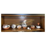 Shelf of Indian Pottery