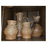 Shelf of Pottery