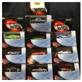 10 Hot Wheels collectibles with display cases: