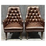 Pair of S.X. Graham Tufted Back Rolling Arm Chairs
