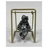 Metal Clown On Swing