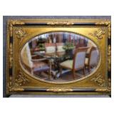 Beveled Oval Mirror in Black & Gold Tone Frame