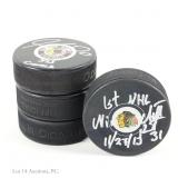 Blackhawks Milestone Signed Pucks (4)