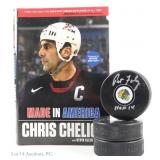Blackhawks HOF Signed Pucks And Book (4)