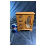 Wooden tabletop jewelry cabinet featuring four