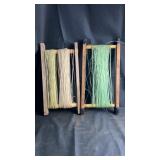 Two wooden handline reels wound with assorted