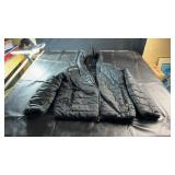 Black New Balance quilted hooded jacket featuring