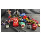 Mixed Toy Vehicles and Action Figures Including