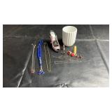 Assorted costume jewelry and small decorative