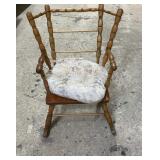 Charming wooden childrenï¿½s rocking chair