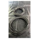 Pair of black extension cable coils suitable for