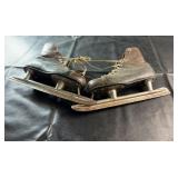 Vintage pair of leather ice skates, size 8,