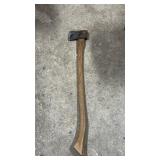 Traditional splitting axe featuring a solid steel