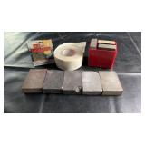 Assorted drywall and sanding supplies including a