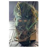 Assorted fishing netting and rope bundled in a