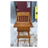 Vintage Wooden High Chair featuring a classic