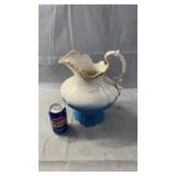 Antique-style porcelain ewer featuring an elegant