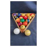 Vintage billiard ball set featuring a full