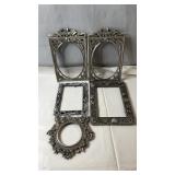 Assorted picture frames in various sizes and