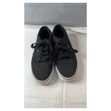 Pair of black Vans low-top sneakers, men's size 9