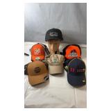 Assorted baseball caps including The Home Depot,