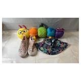 Colorful assortment featuring a plush caterpillar