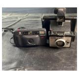 Vintage camera lot featuring a Minolta Freedom