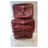 Three-piece Samsonite luggage set in red,