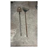Garden tools including a leaf rake and a shovel