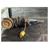 Electric angle grinder with attached cord and