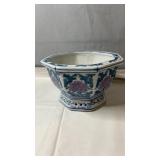 Decorative ceramic planter with blue and pink