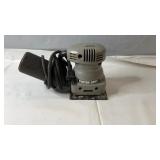 Porter-Cable electric palm sander with attached
