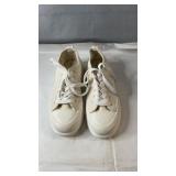 Pair of white canvas lace-up sneakers, size 6.