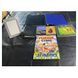 Mixed lot of binders, photo frame, and assorted