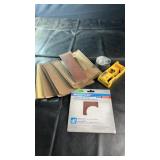 Assorted sanding supplies including multiple