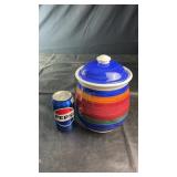 Colorful ceramic lidded jar with bold multicolor