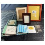 Assorted picture frames and photo storage items