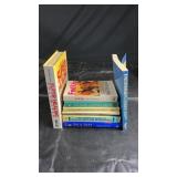 Assortment of health, diet, and wellness books