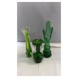Assorted green art glass vases including a tall