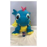 Large plush dragon character toy in bright blue