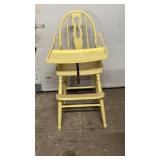Vintage wooden high chair painted yellow,