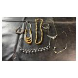 Assorted costume jewelry lot featuring a mix of