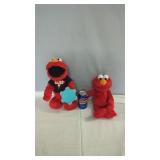 Elmo Plush Toys Pair of Elmo plush toys. One