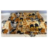 Dog-themed fleece fabric featuring a variety of