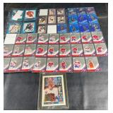 Large assortment of hockey cards with a strong