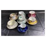 Assorted vintage teacups and saucers in various