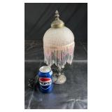 Vintage-style table lamp with decorative beaded