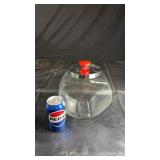 Clear glass countertop jar with chrome-tone lid