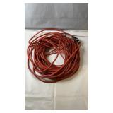 Heavy-duty orange extension cord, unknown length,