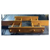Vintage wooden wall-mounted rack set featuring
